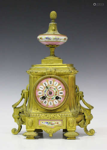 A late 19th century French gilt spelter and porcelain mantel clock with eight day movement striking on a bell via an outside countwheel