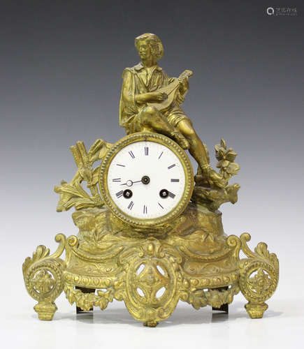 A late 19th century French gilt spelter mantel clock with eight day movement striking on a bell