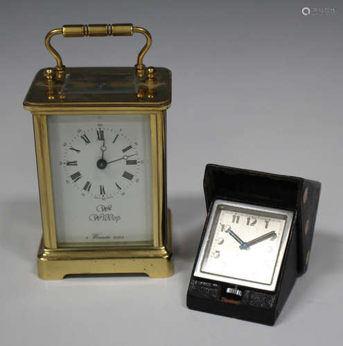 An Art Deco leather cased folding bedside timepiece