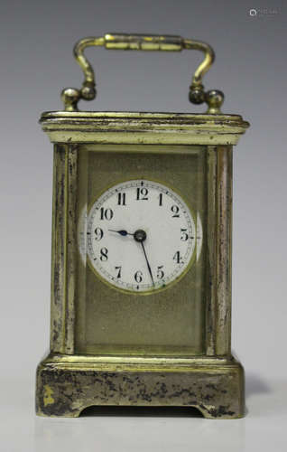 A late 19th/early 20th century French silvered brass diminutive carriage timepiece