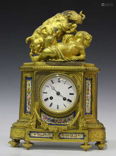 A mid-19th century French ormolu and porcelain mantel clock with eight day movement striking on a bell via an outside countwheel