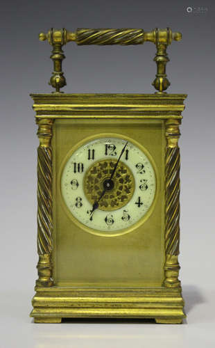 A late 19th/early 20th century French brass carriage timepiece