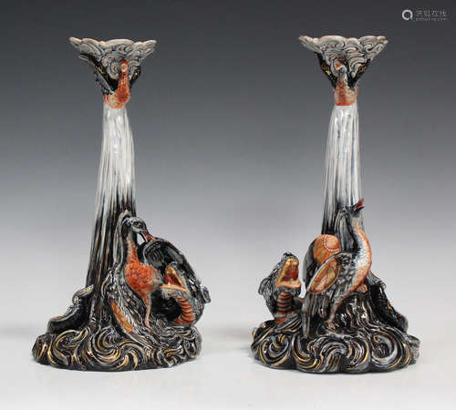 A pair of Keller & Guerin pottery candlesticks