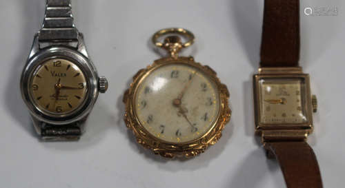 A gold cased keyless wind open-faced lady's fob watch