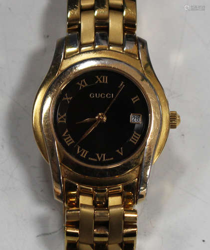 A Gucci gilt metal lady's bracelet wristwatch