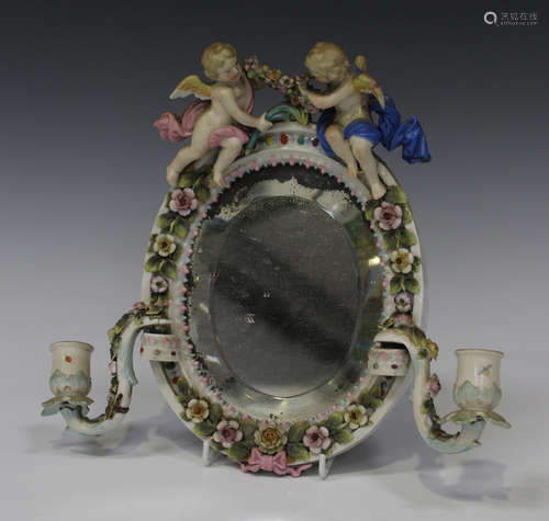 A Dresden porcelain mirror frame