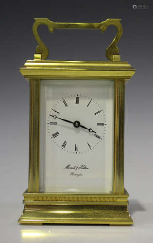 A late 20th century lacquered brass carriage timepiece with eight day movement