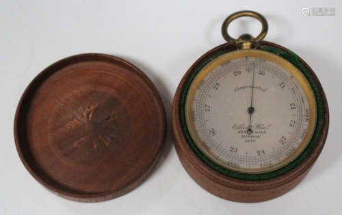 A late 19th/early 20th century gilt brass cased pocket barometer