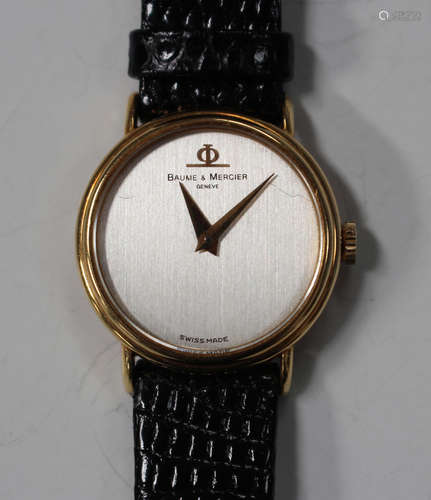 A Baume & Mercier gold circular cased lady's wristwatch