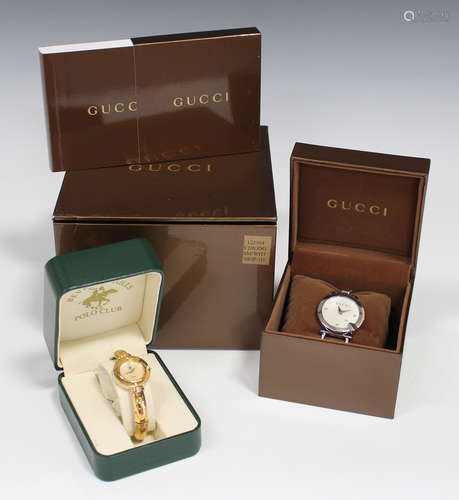 A Gucci steel and diamond set lady's dress bracelet wristwatch