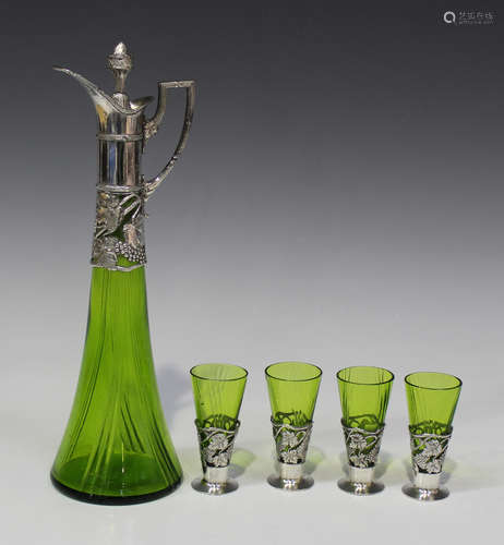 An Art Nouveau WMF silvered pewter and green glass liqueur set