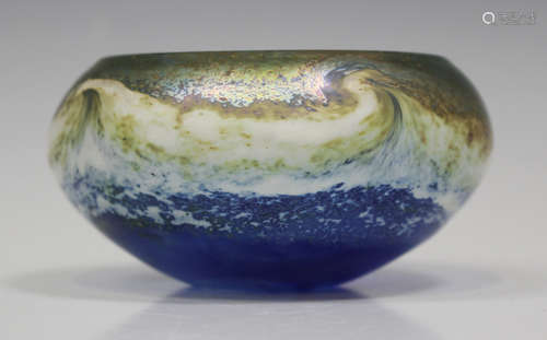 A Norman Stuart Clarke iridescent art glass bowl of circular form