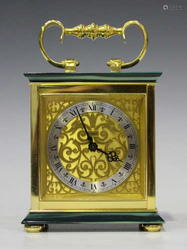 A late 20th century gilt brass and simulated malachite mantel clock with Swiss movement