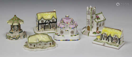 Fifteen Coalport bone china pastille burners in the form of buildings