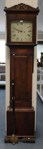 An early 19th century Scottish mahogany longcase clock with eight day movement striking on a bell