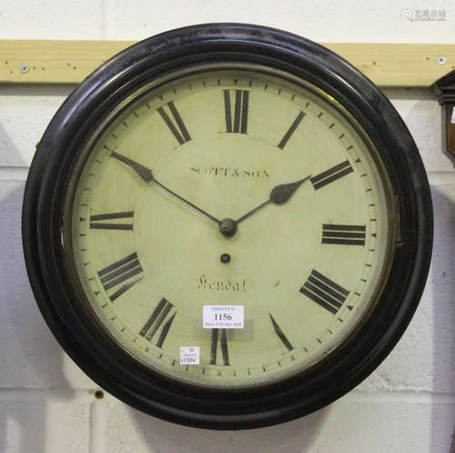 A Victorian ebonized circular wall timepiece with brass single fusee movement