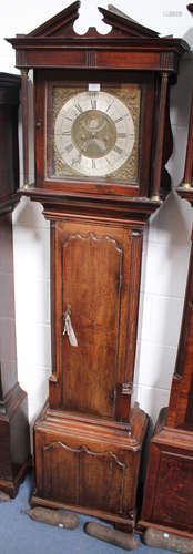 A mid-18th century longcase clock with eight day movement striking on a bell