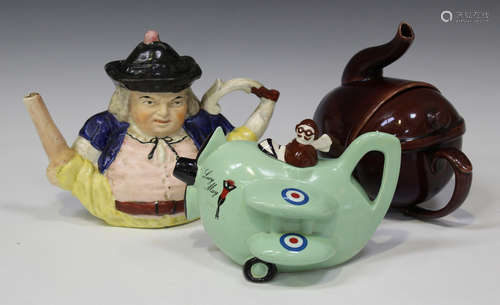 A collection of novelty teapots