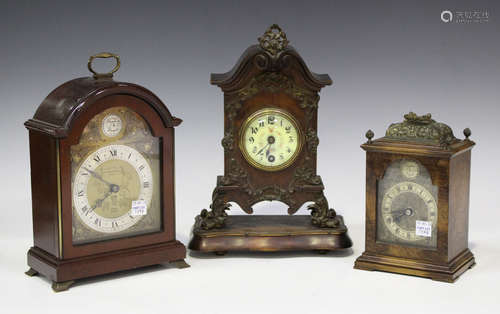 A late 19th century brass mounted walnut mantel timepiece