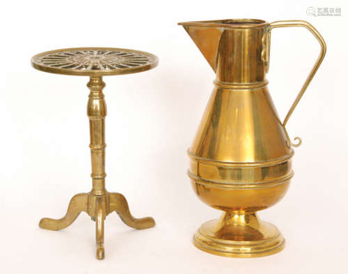 An early 20th Century Ecclesiastical brass jug with angular spout and tapering body