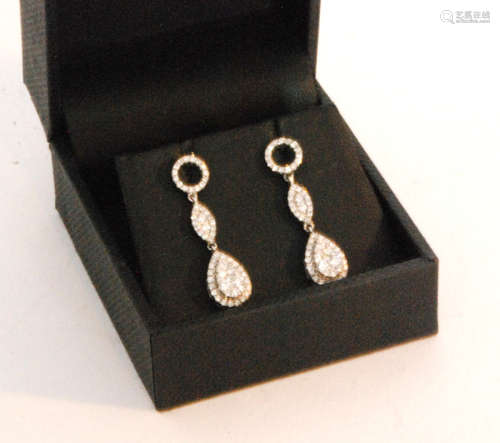 A pair of 18ct white gold diamond pendant earrings