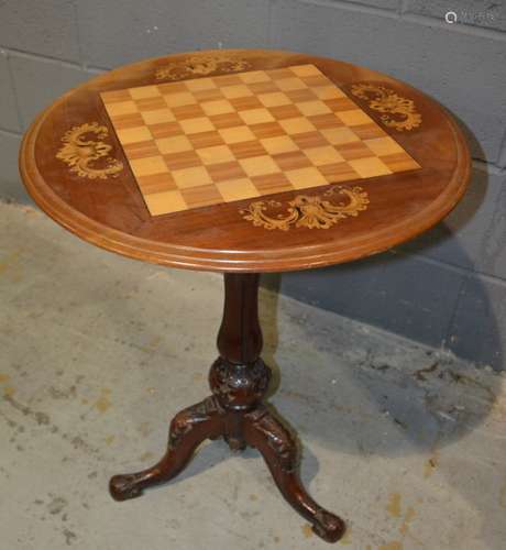 A Victorian mahogany occasional games table of circular form