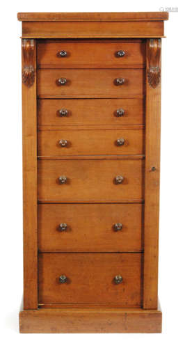 A Victorian mahogany Wellington chest of seven graduated drawers