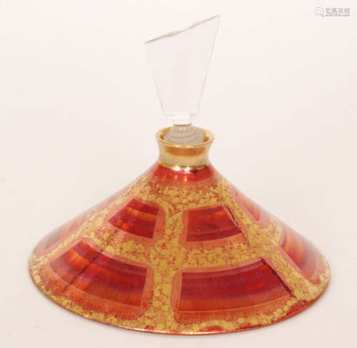 A contemporary Atkinson-Jones Lustreware perfume bottle of conical form decorated in a red and gold lustre with a clear glass shaped stopper