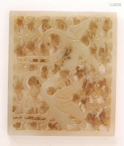 A Chinese Celadon jade  rectangular panel depicting two playful cranes or He with their wings spread against a pierced and carved ground