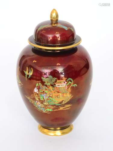 A Carlton Ware New Mikado pattern ginger jar and cover decorated with an enamel and gilt Chinoiserie landscape against a Rouge Royale ground