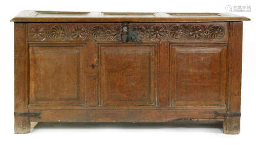 An 18th Century carved oak coffer