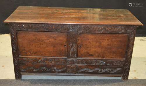 An 18th Century and later carved oak mule chest