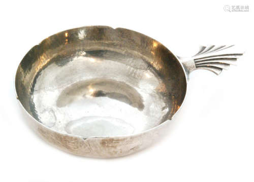 An Art Deco hallmarked silver wine taster