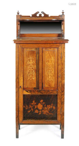 A 19th Century rosewood and marquetry inlaid music cabinet enclosed by a pair of floral decorated doors below a mirrored back