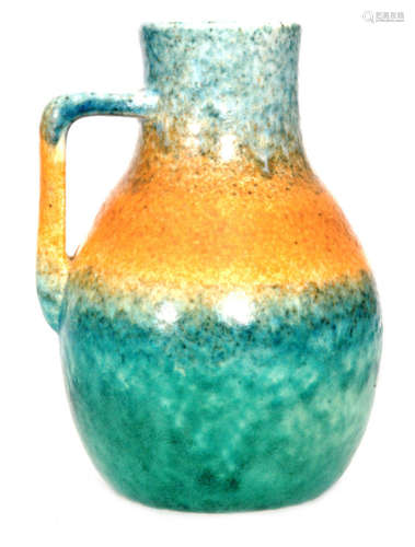 A Ruskin Pottery crystalline glaze flower jug decorated in a mottled blue to orange to green glaze