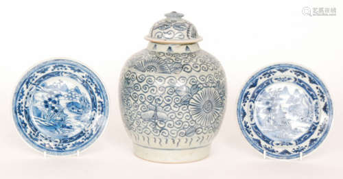 Two late 19th Century Chinese export blue and white plates each decorated with a Chinoiserie landscape