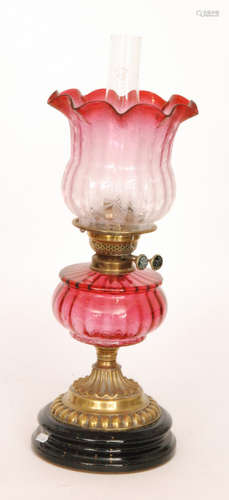 A Victorian style oil lamp and etched shade