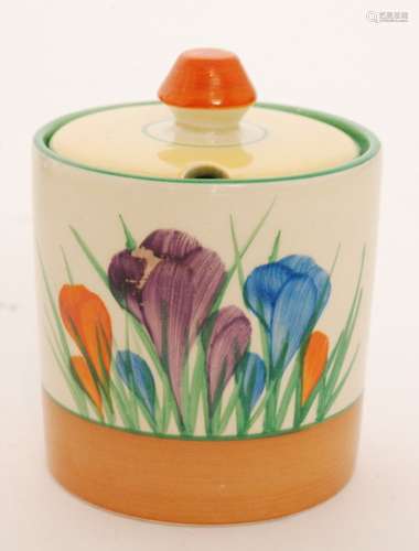 A Clarice Cliff Crocus pattern cylindrical drum preserve pot circa 1950 hand painted with crocus sprays with orange