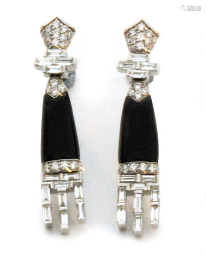 A pair of Art Deco style 18ct white gold onyx and diamond pendant earrings