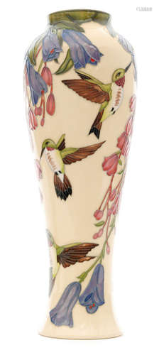 A Moorcroft Pottery vase decorated in the Floral Swing pattern designed by Paul Hilditch