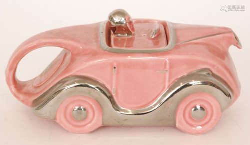 A 1930s Sadler teapot modelled as a pink racing car with silver lustre trims