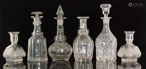 A group of 19th Century and later clear glass decanters comprising two with pillar cut decoration