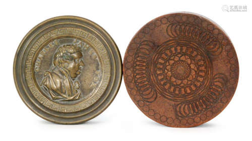 A 19th Century brass snuff box of circular form