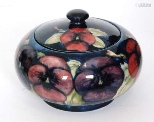 A William Moorcroft Pansy pattern powder box and cover