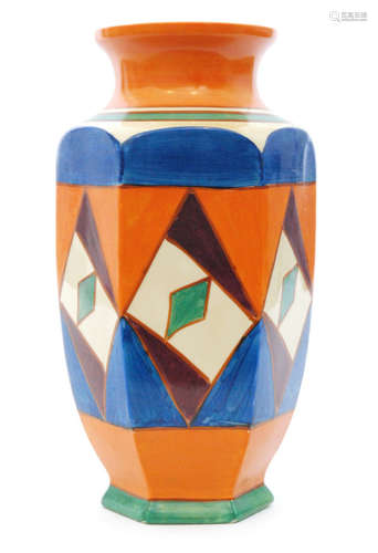 A Clarice Cliff Original Bizarre shape 38 vase of footed hexagonal form with flared collar neck hand painted with panels of interlocking triangles and diamonds in blue