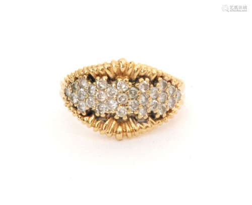 A modern 18ct hallmarked diamond cluster ring comprising twenty nine individually set brilliant cut stones set within a yellow gold border to a elliptical head