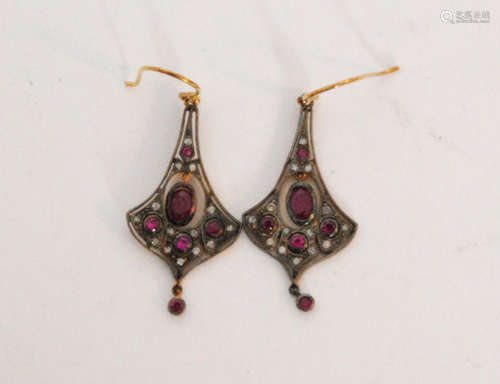 A pair of Edwardian style ruby and diamond pendant earrings