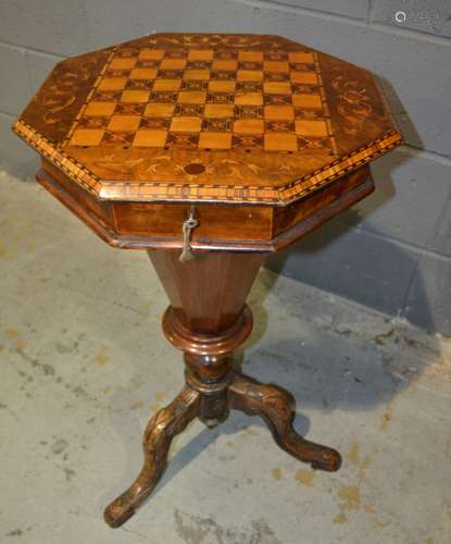 A Victorian walnut octagonal work table