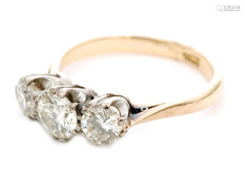 An 18ct diamond three stone ring