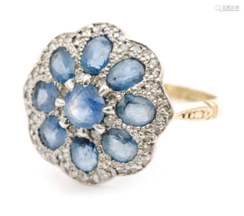 A later 20th Century 18ct sapphire and diamond target cluster ring